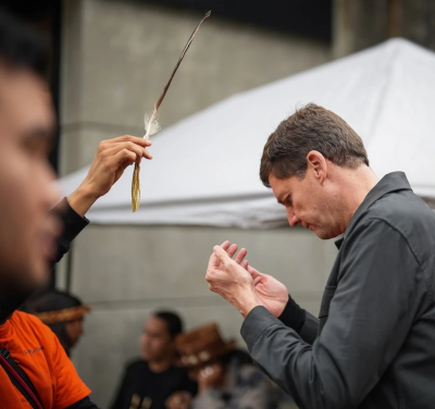 BC premier David Eby sucking up to aboriginals in a pagan rite
